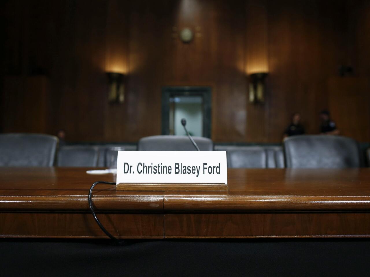 A sign indicates where witness Dr. Christine Blasey Ford will sit to speak to the Senate Judiciary Committee hearing on the nomination of Brett Kavanaugh to be an associate justice of the Supreme Court.