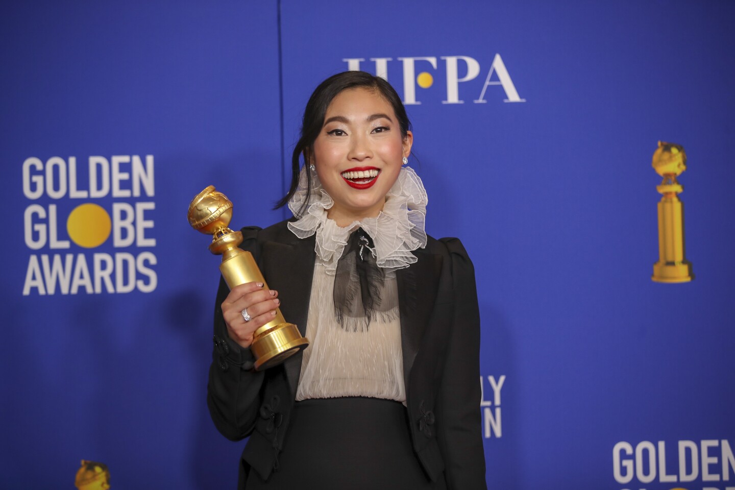 BEVERLY HILLS, CA-JANUARY 05: Awkwafina in the photo deadline room at the 77th Golden Globe Awards at the Beverly Hilton on January 05, 2020 (Allen J. Schaben / Los Angeles Times)