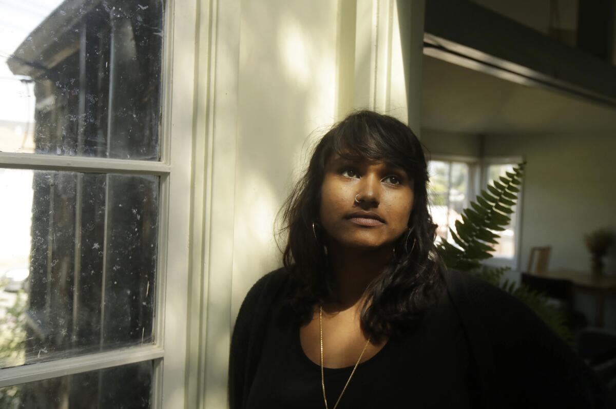 Jiggy Athilingam at her home in Richmond, Calif. Athilingam, who was hit by a car while riding a bicycle in San Francisco five years ago, had two forms of health insurance and assumed it would pay for most of her bills.