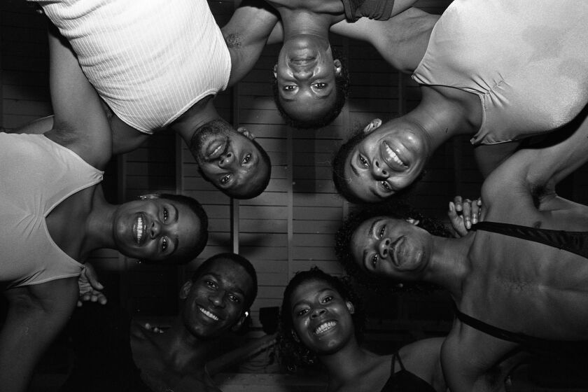 Dancers pose in a huddle formation for the Times' 1982 series "Black L.A.: Looking at diversity."