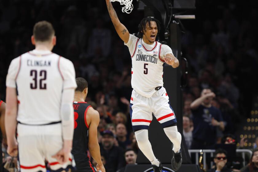 Boston, MA- March 28: UConn's Stephon Castle dunks against San Diego State during a NCAA Tournament Sweet 16 game at the TD Garden on Wednesday, March 28, 2024 in Boston, MA. (K.C. Alfred / The San Diego Union-Tribune)