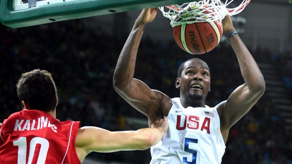 U.S. forward Kevin Durant dunks the ball during a game against Serbia on Aug. 12.