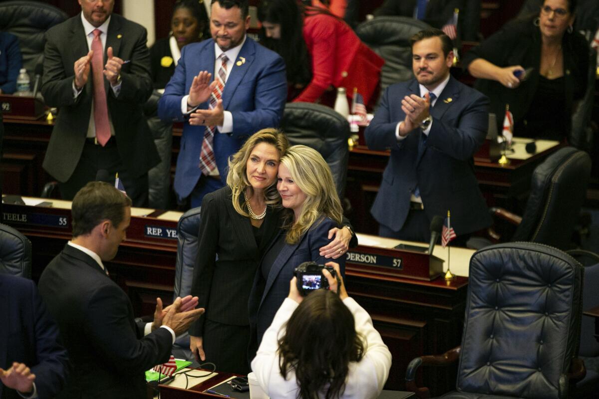 State Reps. Jennifer Canady, left, and Jenna Persons-Mulicka 