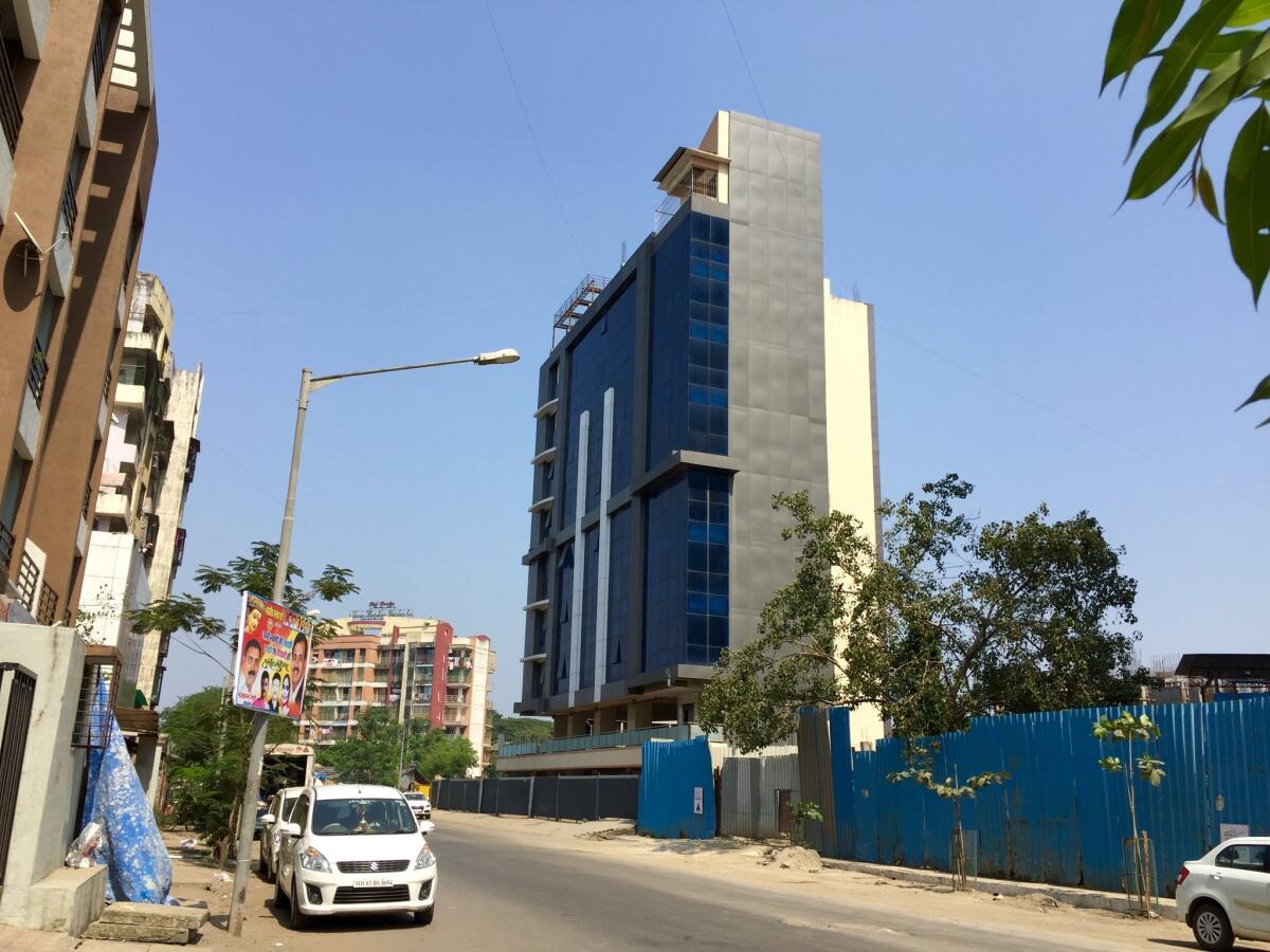 Police in October raided this nine-story tower in Thane, India, where scammers posed as IRS agents to extort money from U.S. taxpayers.
