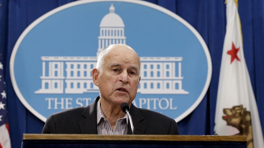 Gov. Jerry Brown discusses his revised 2018-2019 state budget at a Capitol news conference on May 11 in Sacramento, Calif.