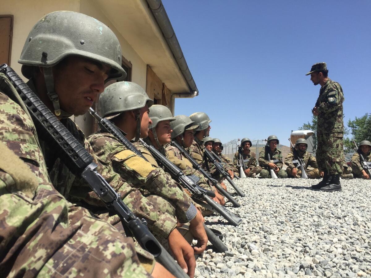 Afghan army recruits take part in a training session in June.