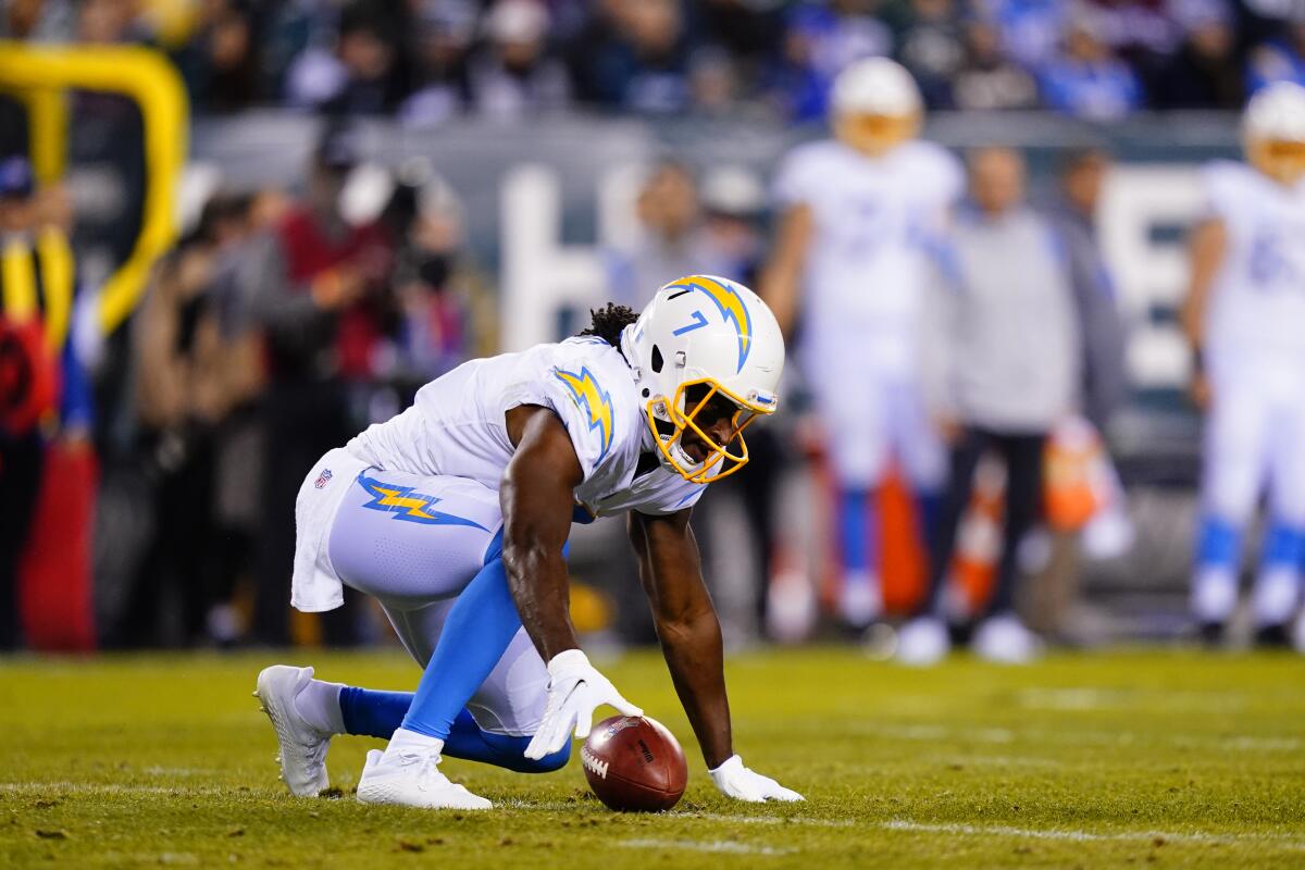  Chargers wide receiver Andre Roberts picks up a kickoff that got loose against the Eagles.
