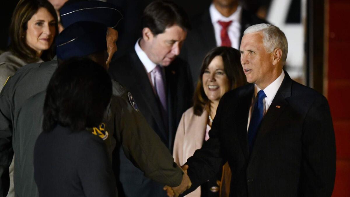 Vice President Mike Pence and his wife, Karen, are welcomed upon their arrival at Yokota Air Base in Tokyo on Nov. 12.
