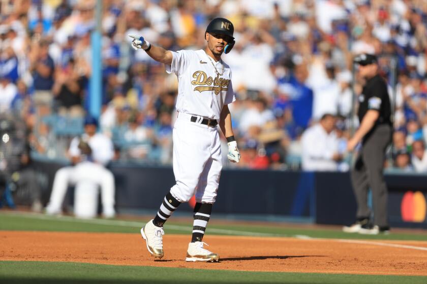 National League Mookie Betts, of the Los Angeles Dodgers, lead off first base during the first inning of the MLB All-Star baseball game, Tuesday, July 19, 2022 in Los Angeles. (Sean M Haffey/ Pool Photo via AP)