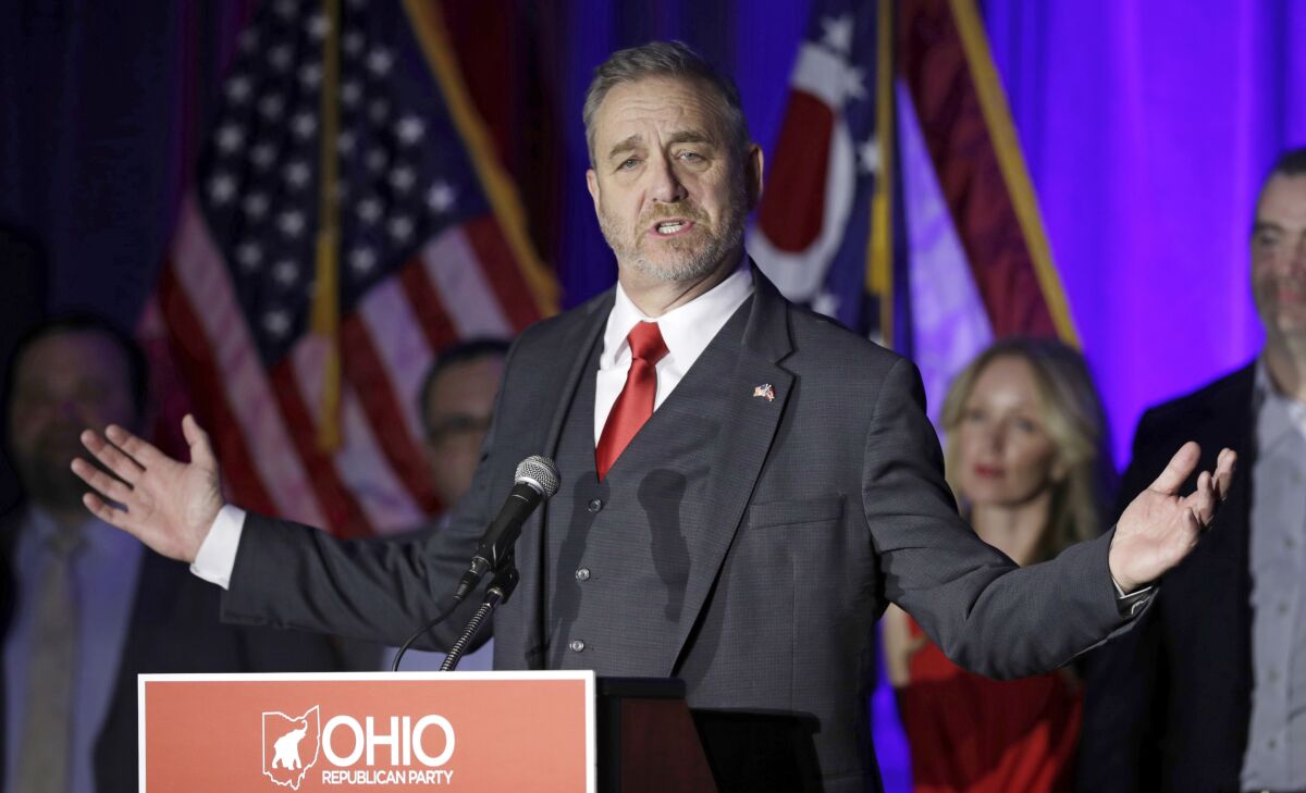 FILE - In this Nov. 6, 2018 file photo, Ohio Attorney General Dave Yost speaks at the Ohio Republican Party event, in Columbus, Ohio. Yost's attempt to block Ohio's nuclear plants from collecting fees on electricity bills that were authorized by a law at the center of a $60 million federal bribery probe was denied by a county judge Friday, Oct. 2, 2020. (AP Photo/Tony Dejak, File)
