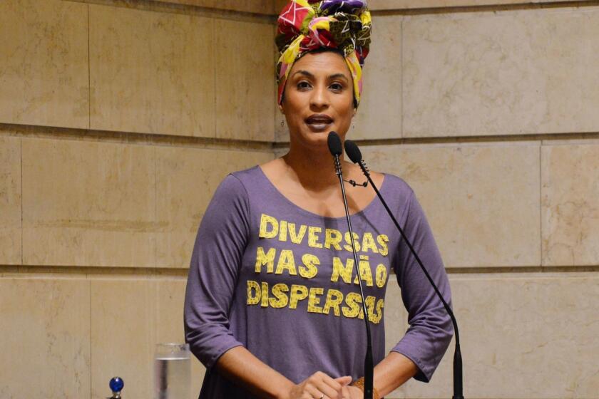 (FILES) This handout file photo taken on November 28, 2017 and released on March 16, 2018, by Rio de Janeiro's Municipal Chamber shows Brazilian councilwoman for the left-wing party PSOL Marielle Franco, leading a session at the Municipal Chamber in Rio de Janeiro, Brazil. - Two police officers were arrested on March 12, 2019 in the killing of Rio city councilor and black gay rights activist Marielle Franco, prosecutors said, almost a year to the day after the brazen murder shocked Brazil. (Photo by Mario VASCONCELLOS / Rio de Janeiro Municipal Chamber / AFP) / RESTRICTED TO EDITORIAL USE - MANDATORY CREDIT "AFP PHOTO - Rio de Janeiro Municipal Chamber / BYLINE - Mario VASCONCELLOS" - NO MARKETING NO ADVERTISING CAMPAIGNS - DISTRIBUTED AS A SERVICE TO CLIENTSMARIO VASCONCELLOS/AFP/Getty Images ** OUTS - ELSENT, FPG, CM - OUTS * NM, PH, VA if sourced by CT, LA or MoD **