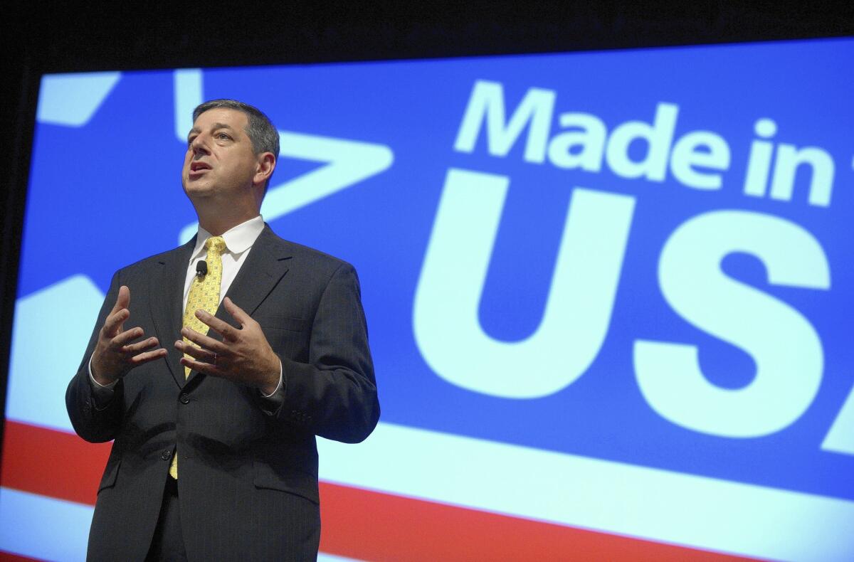 Bill Simon, Wal-Mart's U.S. president and CEO, will be “transitioning out of the company,” Wal-Mart said, but did not give a reason for the shake-up. Above, Simon talks Thursday at the Wal-Mart U.S. Manufacturing Summit in Orlando, Fla.