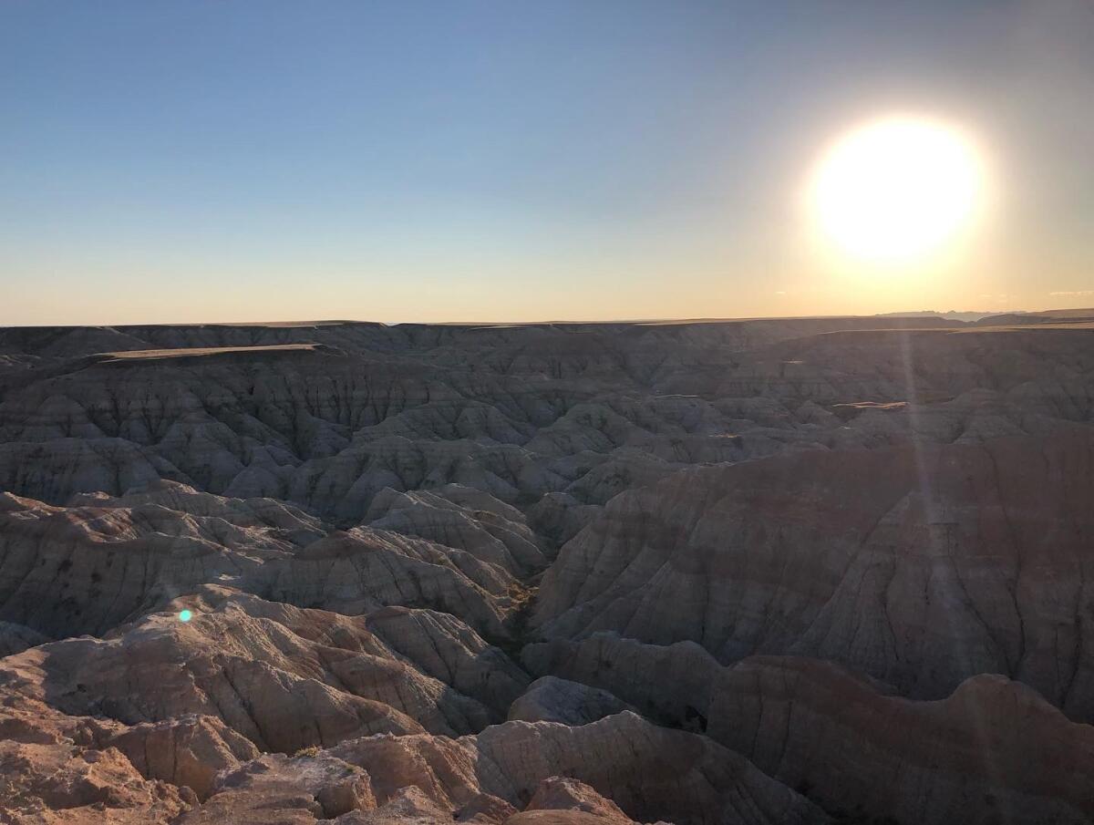 The sun sets over Badlands National Park.