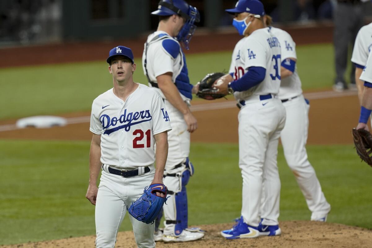Dodgers starting pitcher Walker Buehler is pulled during the sixth inning of Game 1 of the NLCS.