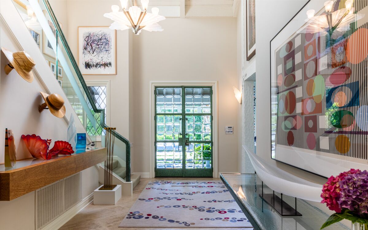 The Pacific Palisades property once owned by actor Ted Knight centers on a five-bedroom home.
