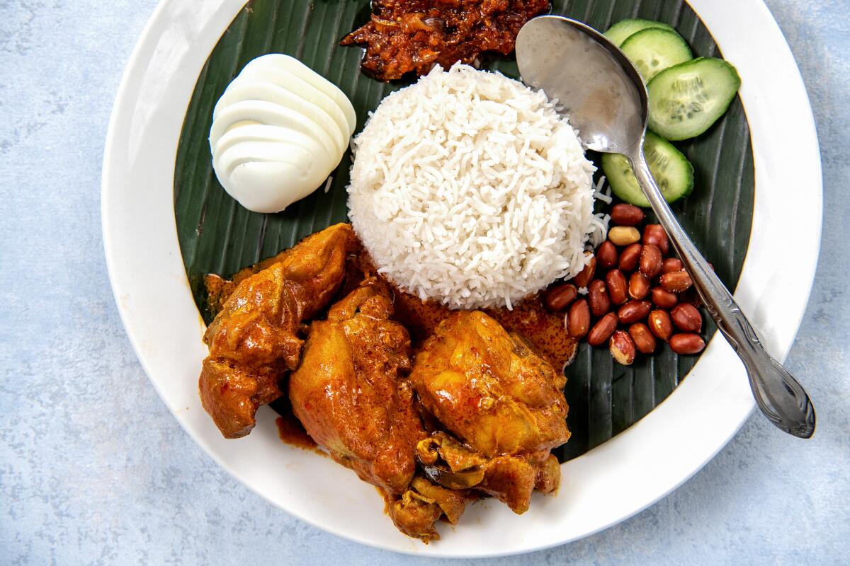 Nasi lemak with chicken curry 