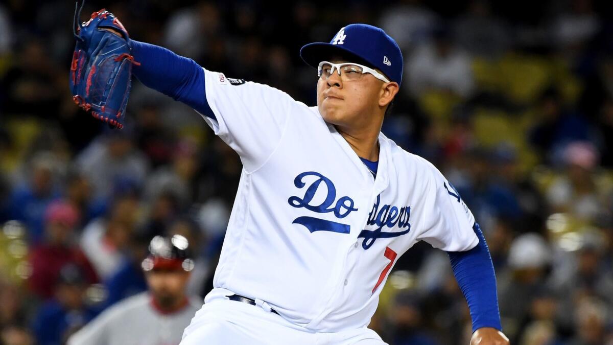 Dodgers relief pitcher Julio Urias delivers in the seventh inning against the Washington Nationals at Dodger Stadium on Friday.