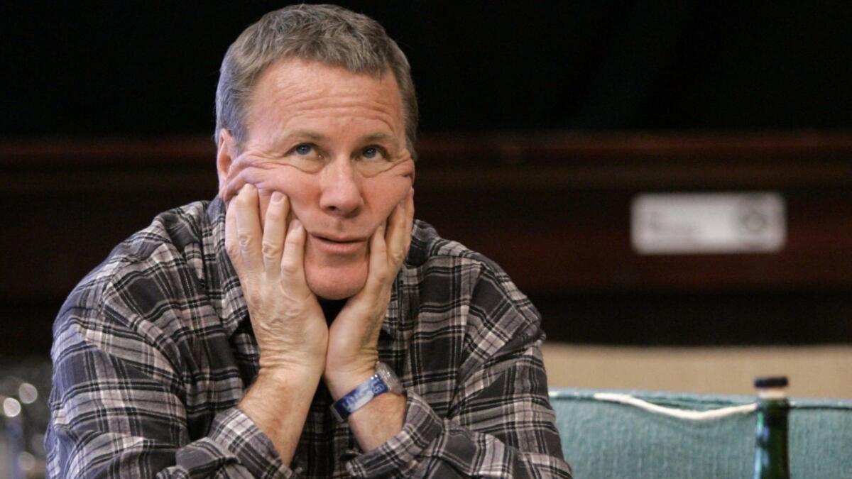 John Heard rehearses for the play "Love-Lies-Bleeding" in Chicago in 2006. Heard, best known for playing the father in the "Home Alone" movie series, has died at 71.