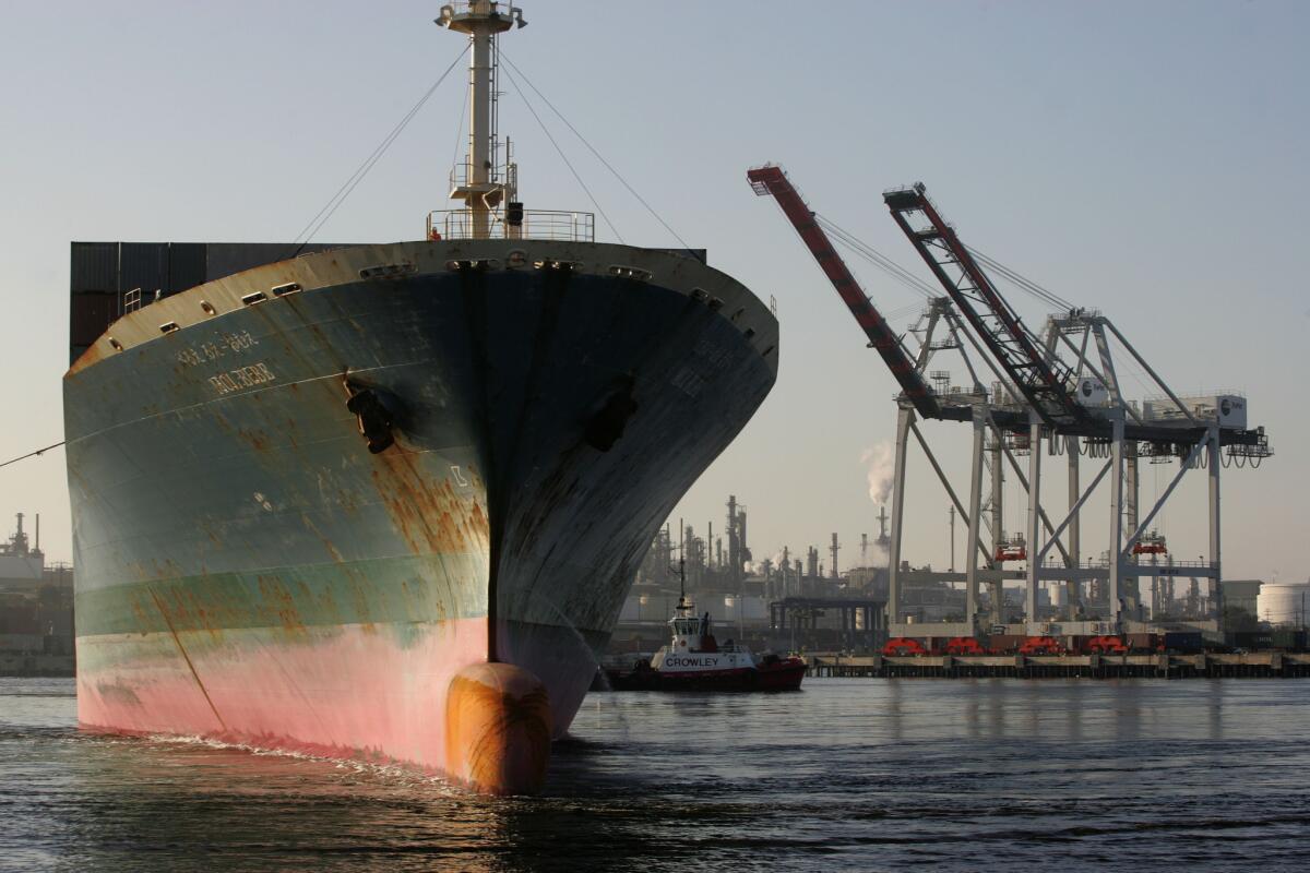 A file photo shows a cargo ship leaving the TraPac terminal at the Port of Los Angeles.