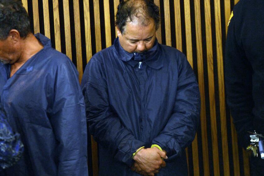Suspect Ariel Castro stands during his arraignment last week in Cleveland.