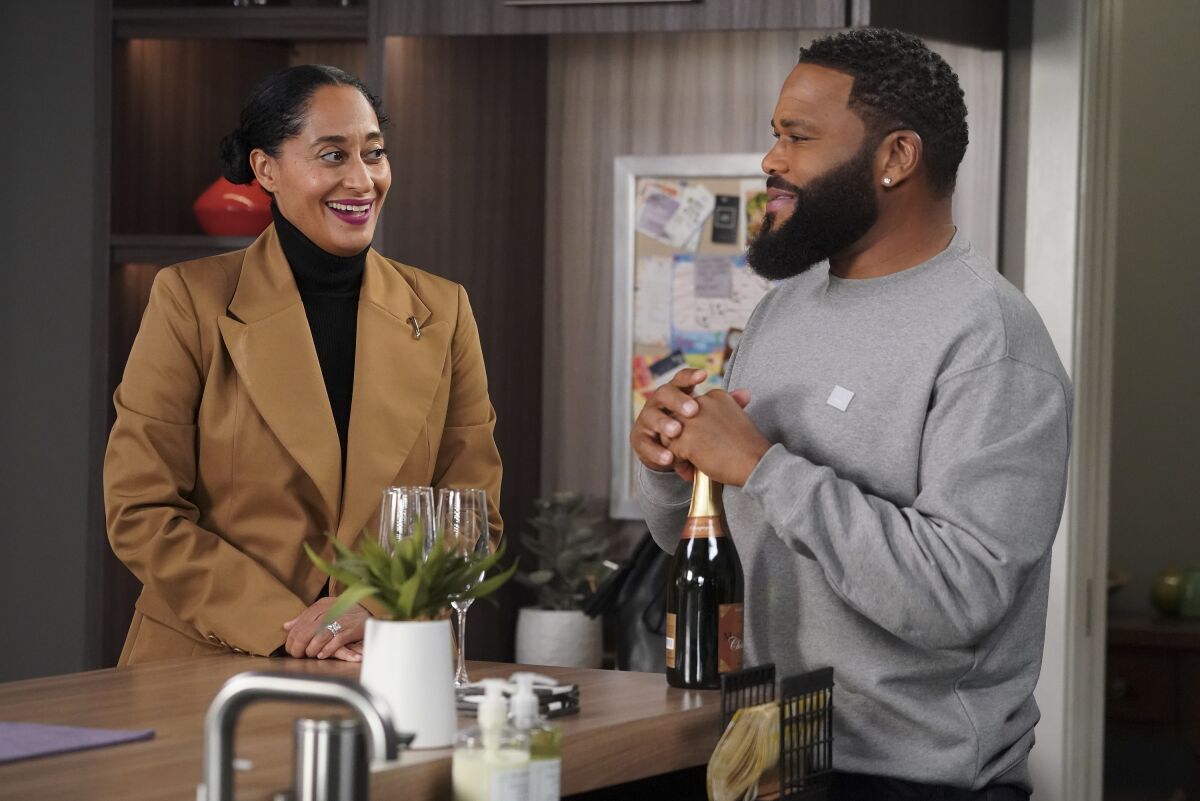 This image released by ABS shows Tracee Ellis Ross, left, and Anthony Anderson in a scene from "black-ish." “This Is Us,” “black-ish” and “Better Call Saul” are among the shows to be saluted at the Paley Center for Media’s annual TV festival. PaleyFest LA is returning to live events after two years of pandemic-caused virtual editions. The 39th annual PaleyFest will run from April 2-10 and include 10 events featuring the casts and creators of 13 series. (Richard Cartwright/ABC via AP)