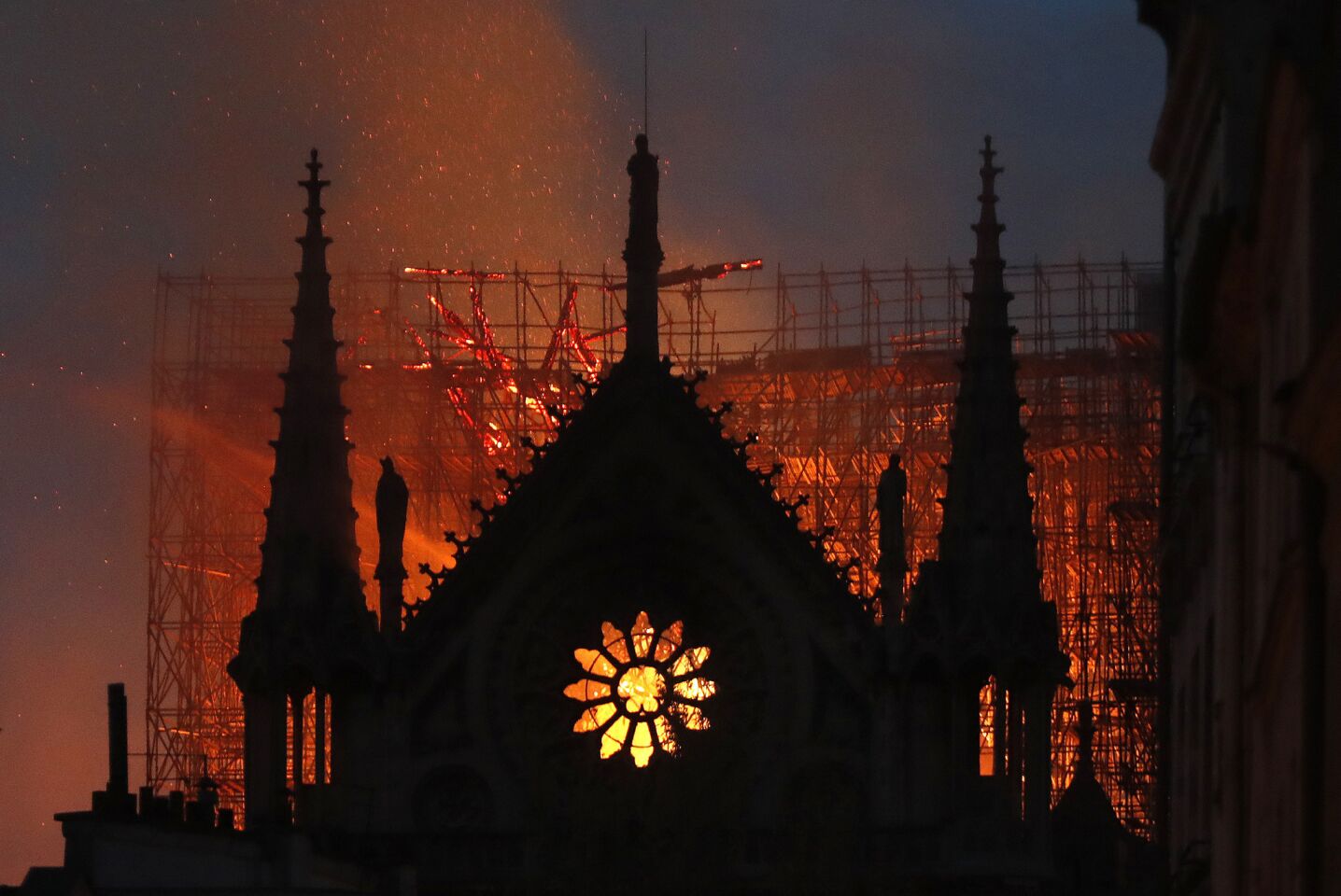 Flames and smoke rise from Notre Dame Cathedral in Paris on Monday, April 15, 2019. A ferocious and fast-moving blaze, which broke out about 6:45 p.m., destroyed large parts of the 850-year-old Gothic monument.