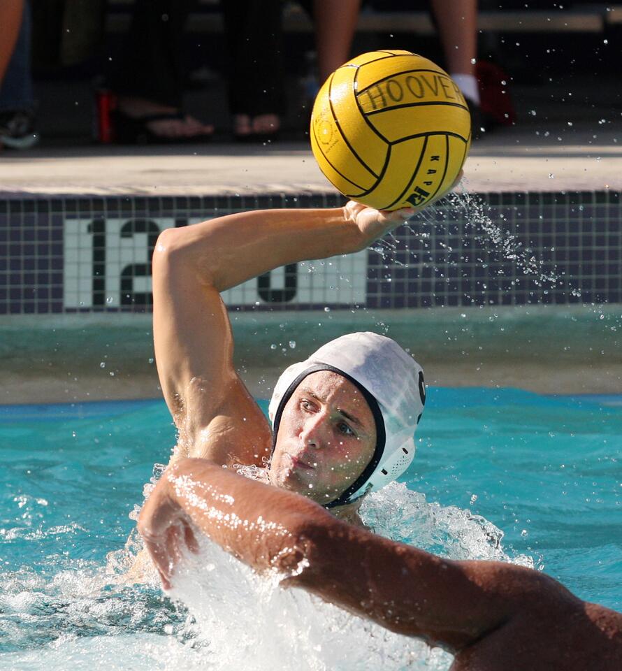 Crescenta Valley's Nate Fernandez shoots against Hoover in a Pacific League boys water polo match in the first half at Hoover High School on Tuesday, October 8, 2013.