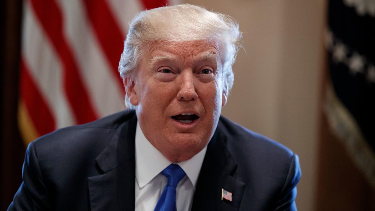 President Donald Trump speaks during a meeting in the Cabinet Room of the White House in Washington on Jan. 9.