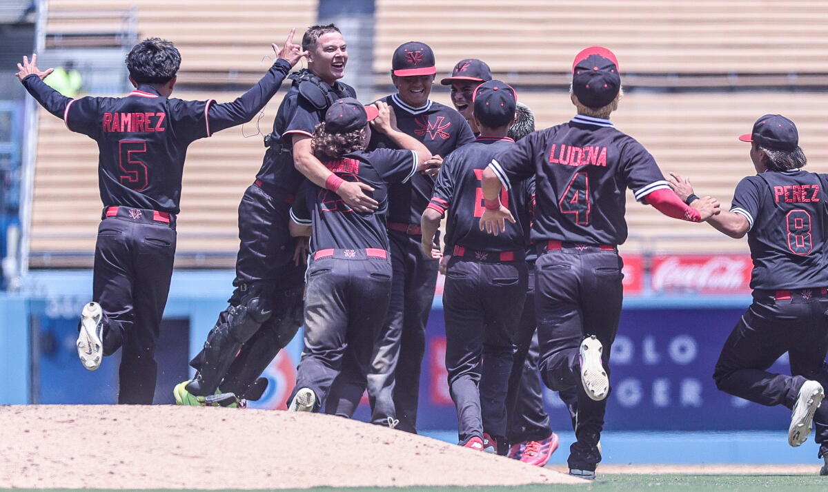 Verdugo Hills players celebrate their victory over Taft in the City Section Division I final on Saturday at Dodger Stadium.
