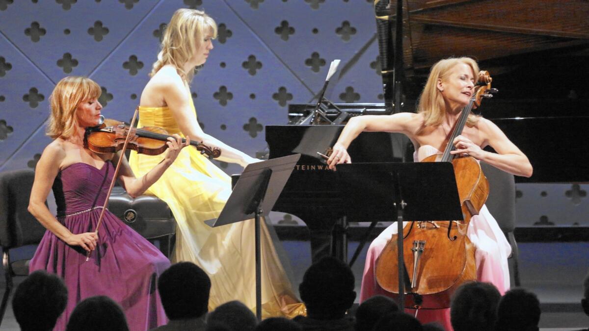 The Eroica Trio — Sara Parkins, left, Erika Nickrenz and Sara Sant’Ambrogio — perform at the Beck man Auditorium in Pasadena on Sunday. The program included Bach and Schubert as well as Michael Torke.