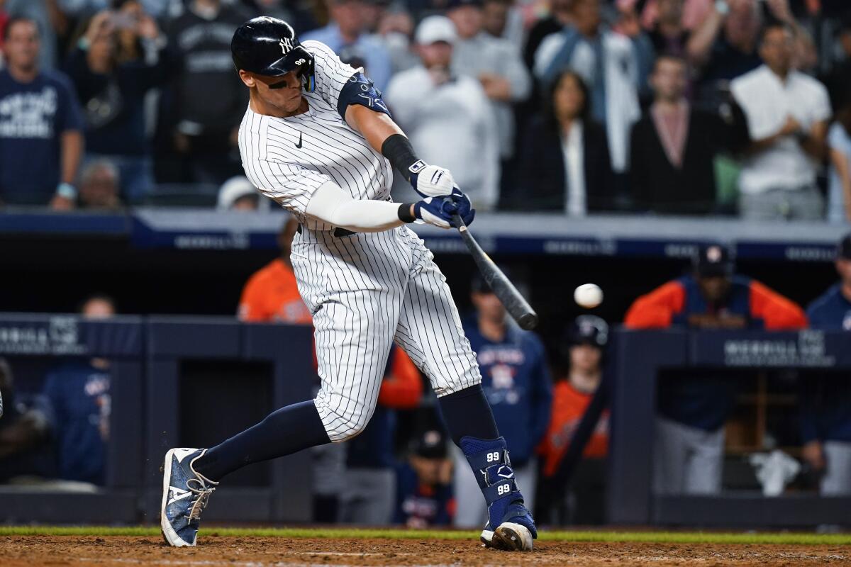 American League's Aaron Judge, of the New York Yankees, walks back to the  dugout after striking out during the third inning of the MLB All-Star  baseball game against the National League, Tuesday