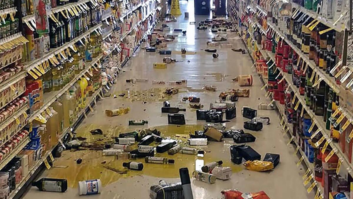 Broken bottles and other goods are seen in a store in Lake Isabella, Calif., after a 6.4 magnitude quake hit Southern California on Thursday morning.
