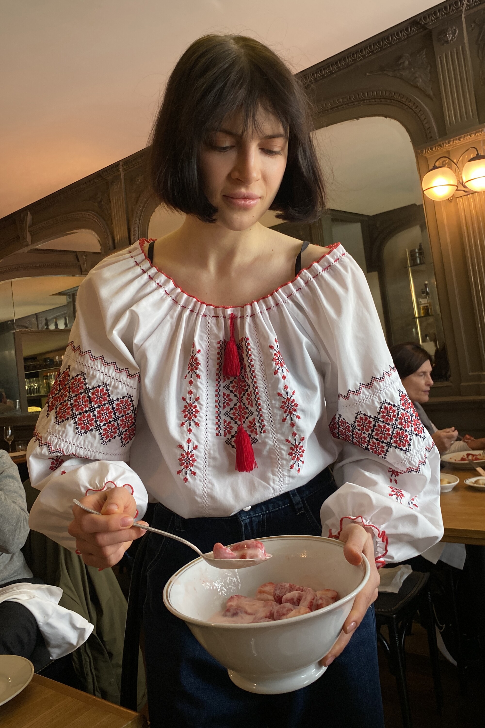 Alina Prokopenko serves a meal: