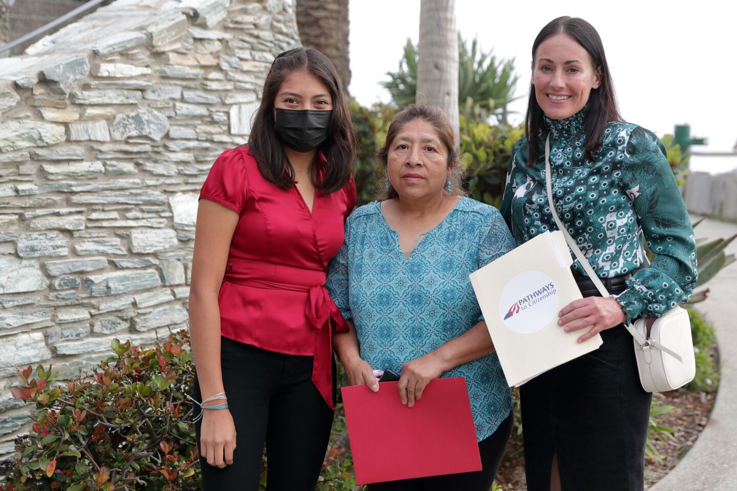 Brenda Jimenez Lopez, Guillermina Navarrete, and Morgan Principi representing Pathways to Citizenship