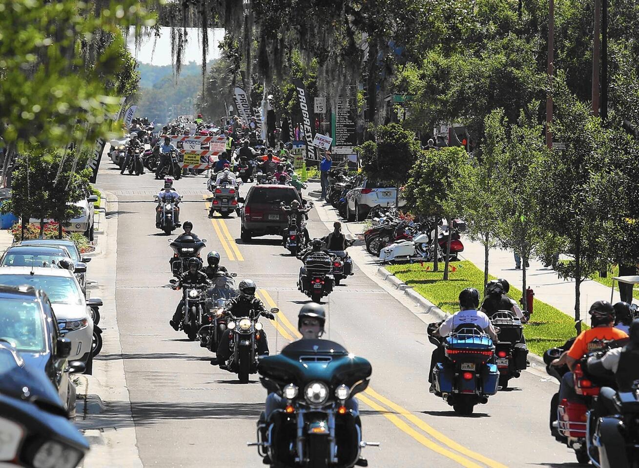 Motorcycles rumble down Main Street in Leesburg on the final day of the Leesburg Bikefest on Sunday, April 23, 2016. (Stephen M. Dowell/Orlando Sentinel)