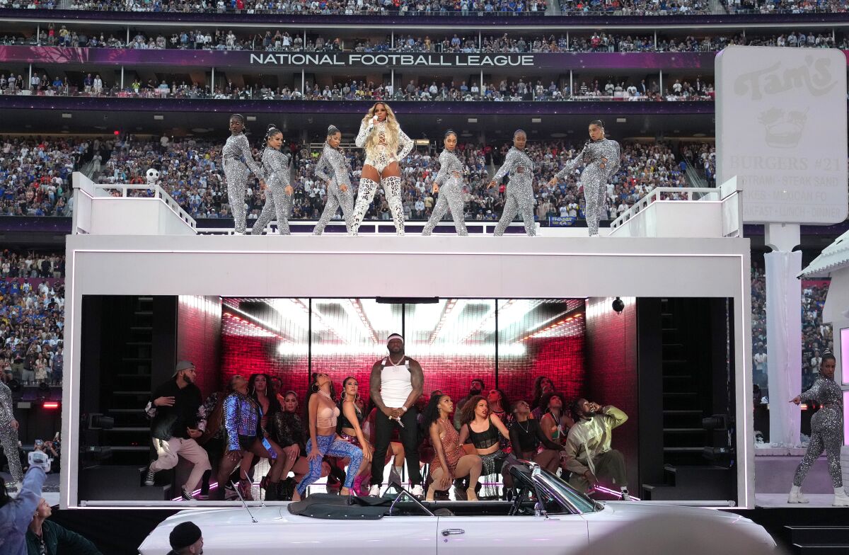 Mary J. Blige and 50 Cent perform during the Super Bowl halftime show at SoFi Stadium.