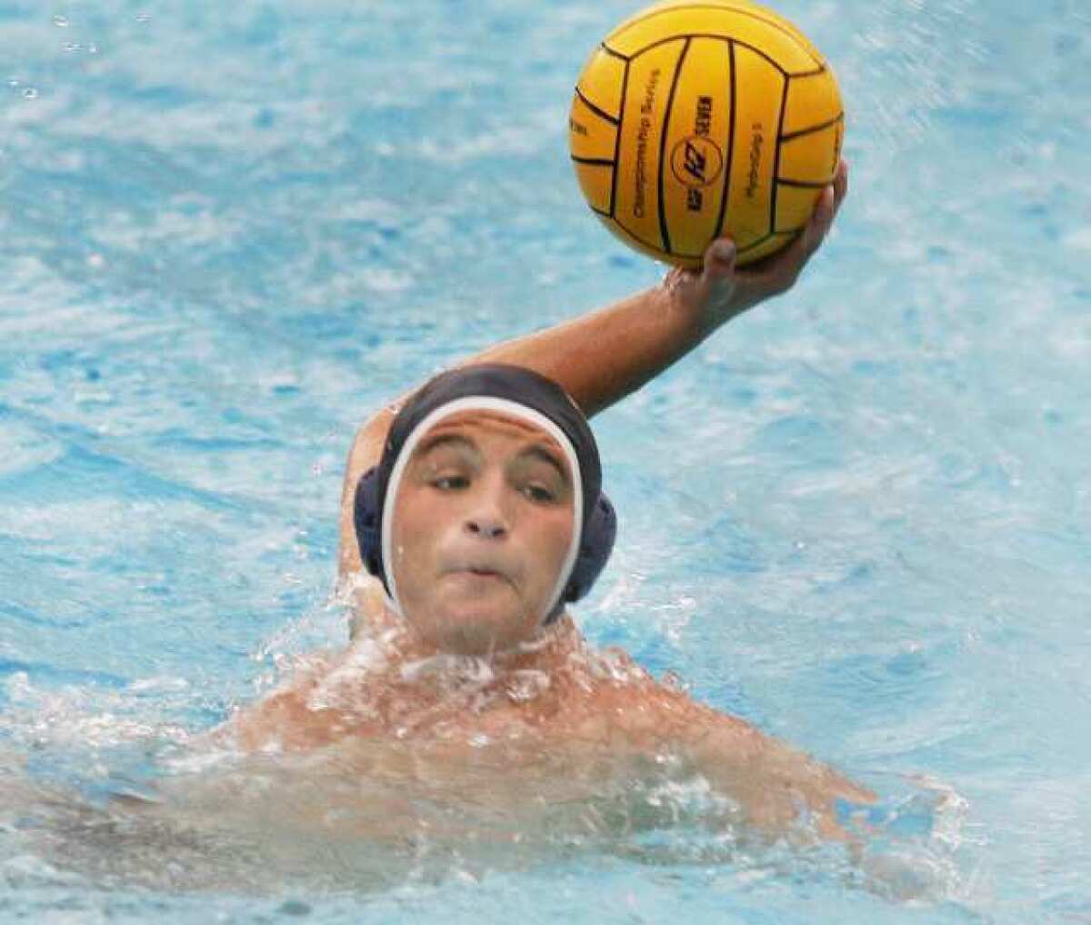 Crescenta Valley's Alexander Trimis winds up a shot against Hoover.