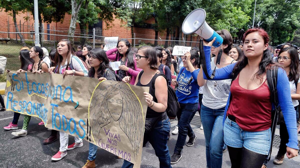 Women protest the killing of former student Lesby Berlin Osorio outside the Faculty of Political and Social Sciences of the National Autonomous University of Mexico in Mexico City on May 5, 2017.
