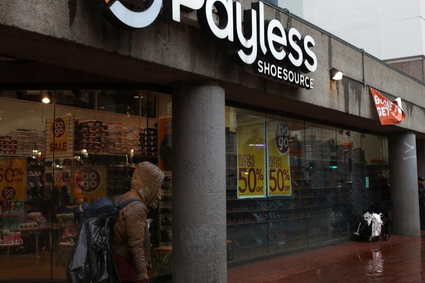 SAN FRANCISCO, CALIFORNIA - FEBRUARY 08: A pedestrian walks by a Payless Shoe store on February 08, 2019 in San Francisco, California. Payless is preparing to file for a second bankruptcy and shutter many, if not all of its North American stores. (Photo by Justin Sullivan/Getty Images) ** OUTS - ELSENT, FPG, CM - OUTS * NM, PH, VA if sourced by CT, LA or MoD **