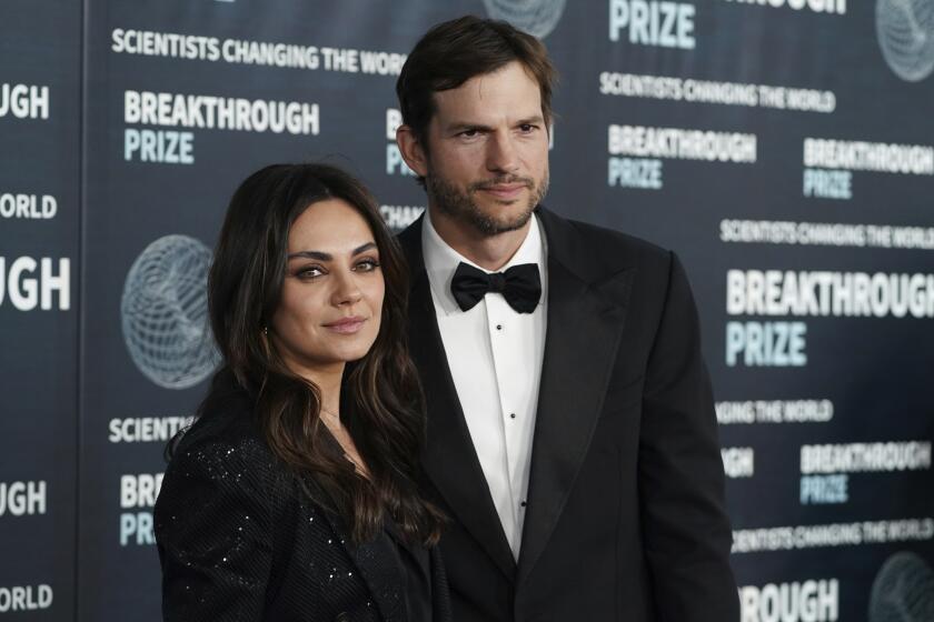 Mila Kunis, left, and Ashton Kutcher arrive at the ninth Breakthrough Prize Awards on Saturday, April 15, 2023, at The Academy Museum of Motion Pictures in Los Angeles. (Photo by Jordan Strauss/Invision/AP)