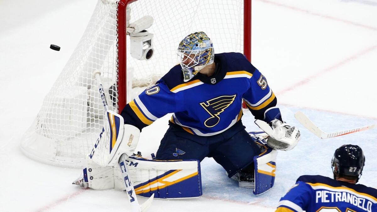 Blues goaltender Jordan Binnington watches the puck fly past him during the third period against the San Jose Sharks on May 17.