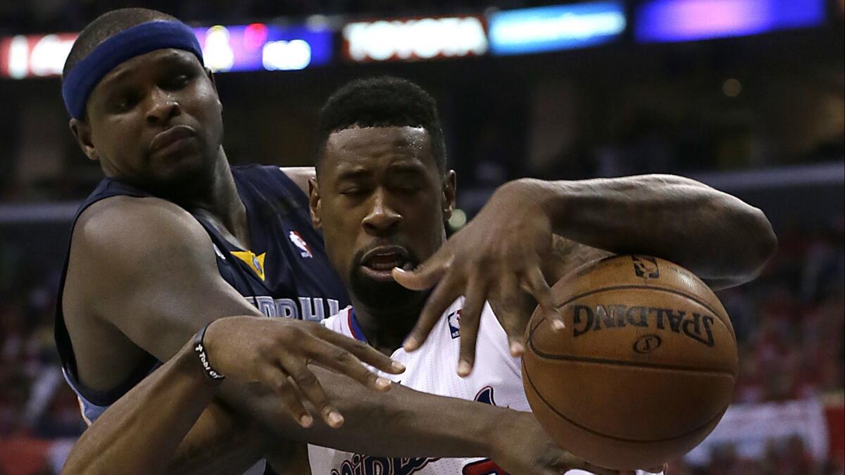 Zach Randolph knocks the ball from the grasp of center DeAndre Jordan during the second half of Game 5 of the of the NBA playoffs at Staples Center in 2013.
