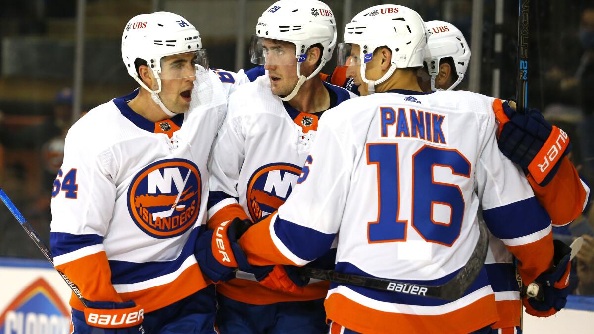 Islanders earn 1st win in new arena, beat New Jersey 4-2 - The San Diego  Union-Tribune