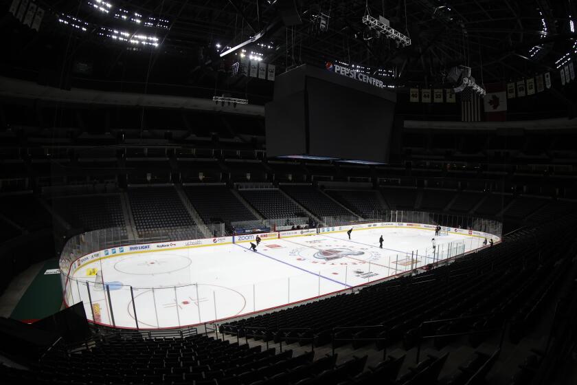 Colorado Avalanche players take part in drills during the team's practice in an empty Pepsi Center Monday, July 13, 2020, in Denver. (AP Photo/David Zalubowski)