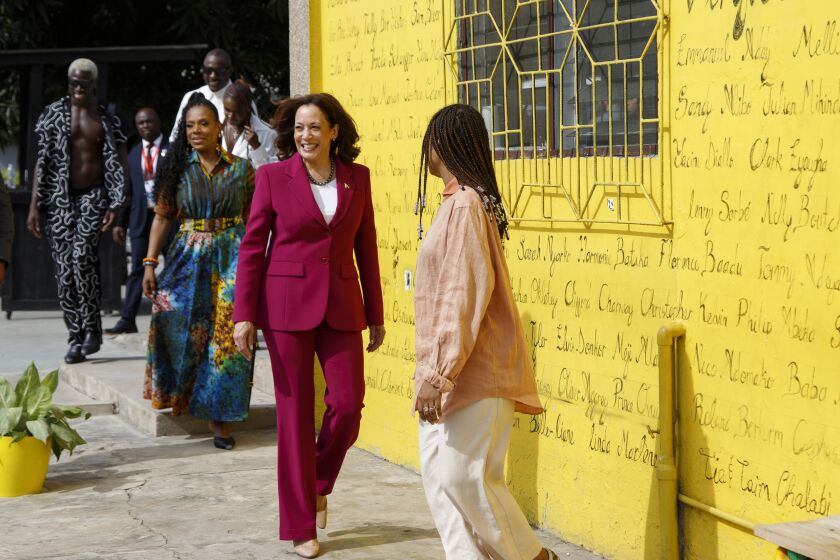U.S. Vice President Kamala Harris, centre, followed by actress Sheryl Lee Ralph, visits the Vibration studio at the freedom skate park in Accra, Ghana, Monday March 27, 2023. Vibration studios is a work station for young creative artists that includes a community recording studio and music business program. Harris is on a seven-day African visit that will also take her to Tanzania and Zambia. (AP Photo/Misper Apawu)
