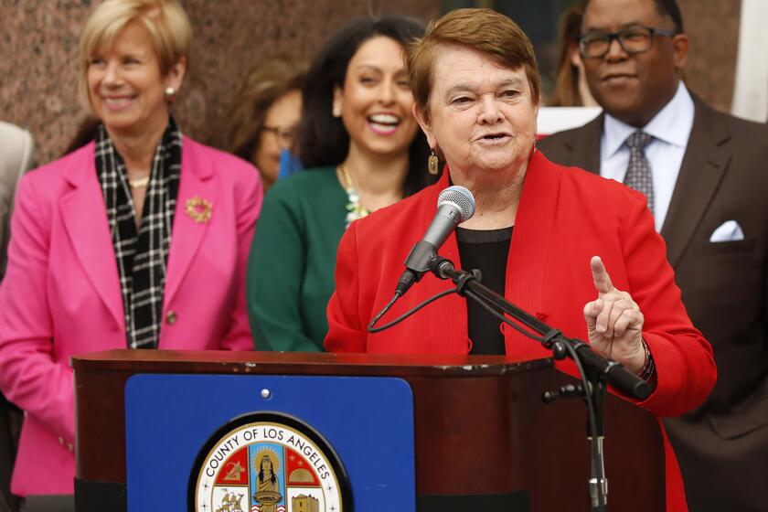 LOS ANGELES, CA - DECEMBER 13, 2016 - Supervisor Sheila Kuehl, center, with supervisors Janice Hahn, Nury Martinez, member of the Los Angeles City Council, and Mark Ridley-Thomas during a Dec. 2016 press conference. (Al Seib / Los Angeles Times)