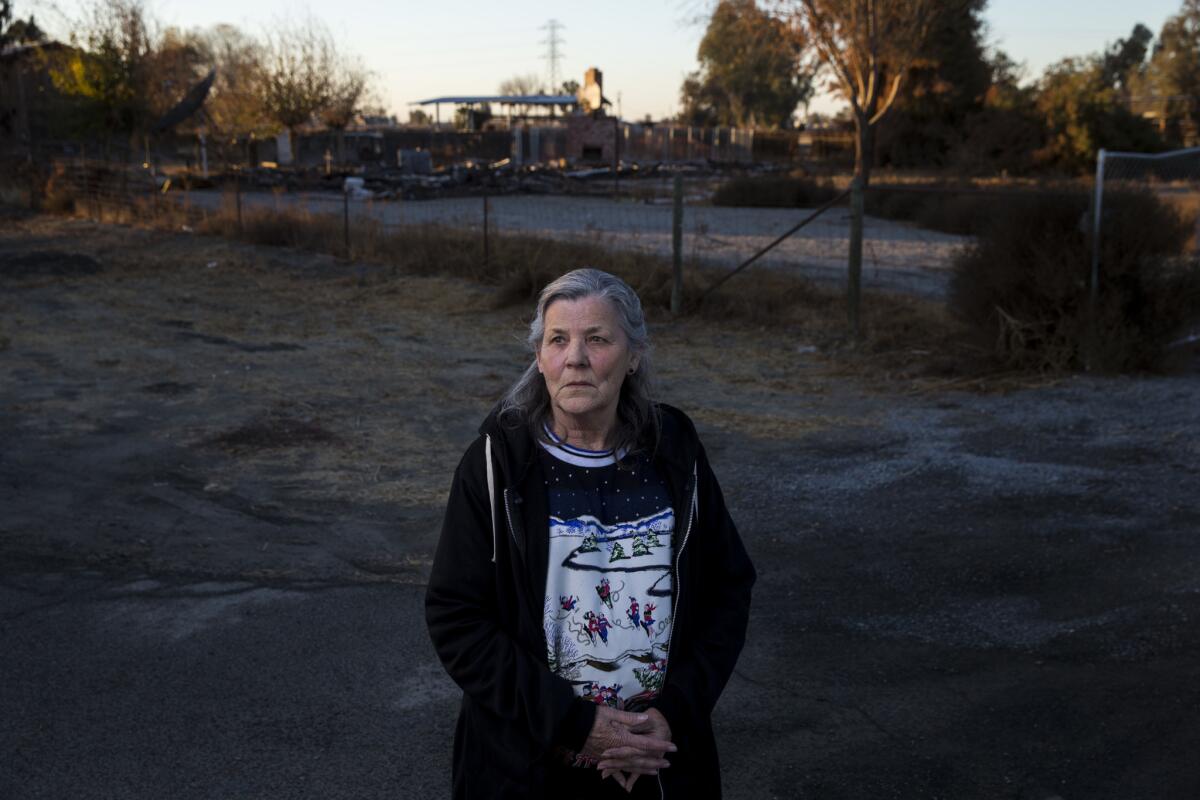 Charlene Hook near the site where her home once stood in Corcoran.