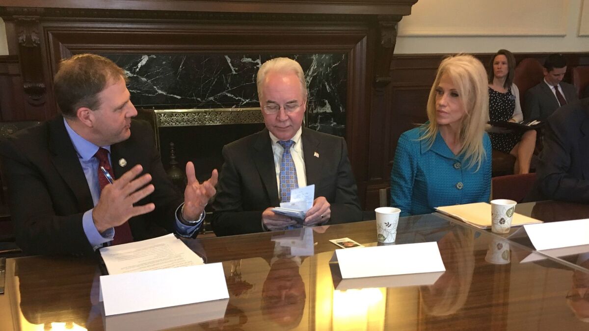 Secretary of Health and Human Services Tom Price, center, meeting with New Hampshire Gov. Chris Sununu and White House advisor Kellyanne Conway last month for a discussion of the state's opioid crisis.
