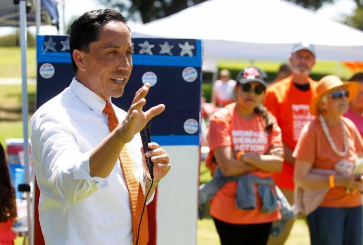 A bill that would end gun shows at the Del Mar Fairgrounds has advanced to the governor’s desk after months of advocacy from Assemblyman Todd Gloria, pictured here speaking at a picnic and community fair hosted by the Wear Orange coalition last year.