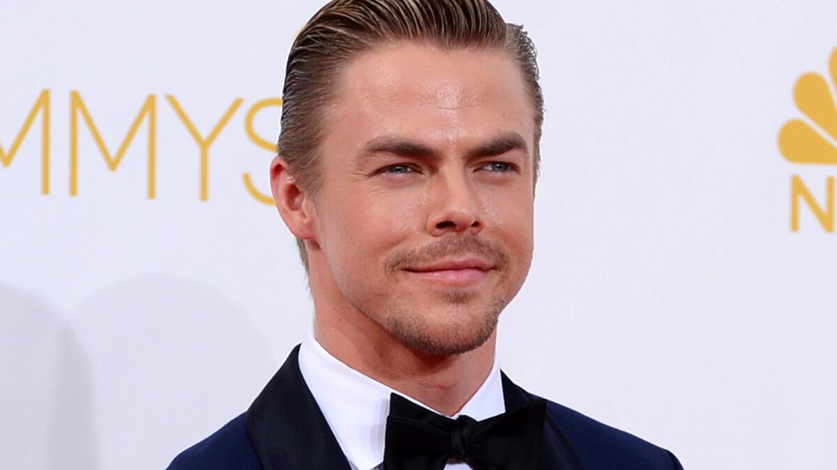 Derek Hough said he stubbed his toe on a light fixture and, on his hasty way to get ice for the first injury, he "rolled" his other ankle, causing more serious damage.
